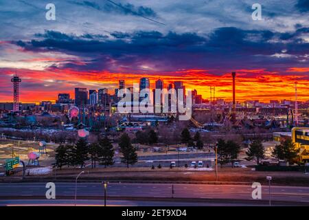 I took this sunrise over the Denver skyline when the colors were exploding in the sky behind downtown. Stock Photo