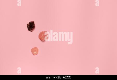 creative minimal layer with ornamental stones on pink Stock Photo