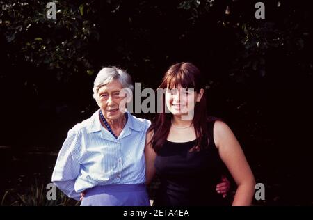 Portrait of Ninety Year old woman and Teenage Great Niece Stock Photo