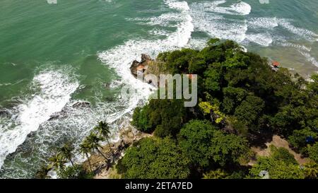 Aerial view of Karang Bolong Beach and Its Wonderful Sunset View. At anyer beach with noise cloud and cityscape. Banten, Indonesia, March 3, 2021 Stock Photo