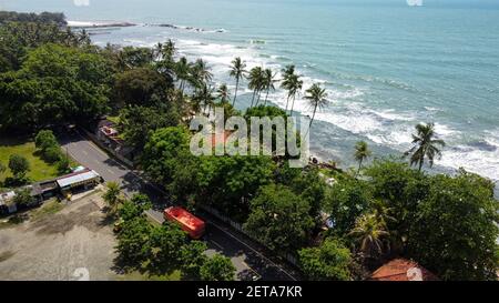 Aerial view of Karang Bolong Beach and Its Wonderful Sunset View. At anyer beach with noise cloud and cityscape. Banten, Indonesia, March 3, 2021 Stock Photo