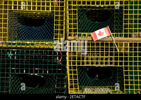 Canadian flag and Lobster Traps, Grand Manan Island, New Brunswick, Canada Stock Photo