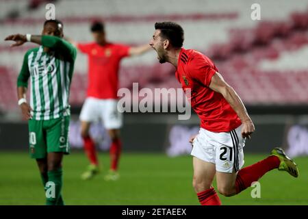 Lisbon, Portugal. 1st Mar, 2021. Pizzi of SL Benfica celebrates after scoring a goal during the Portuguese League football match between SL Benfica and Rio Ave FC at the Luz stadium in Lisbon, Portugal on March 1, 2021. Credit: Pedro Fiuza/ZUMA Wire/Alamy Live News Stock Photo