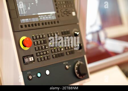 Control panel of CNC machining center close up. Selective focus. Stock Photo