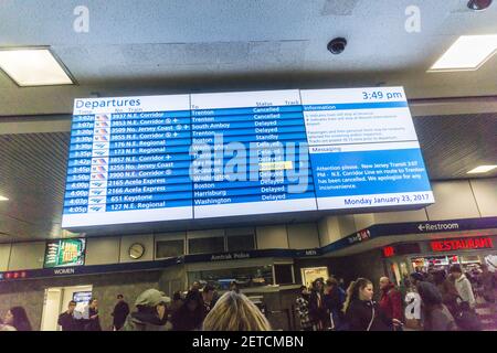 A digital Amtrak and NJ Transit departure board in Penn Station in New York on Monday, January 23, 2017 shows train service on Amtrak and NJ Transit has been severely disrupted with many trains cancelled because of the N'oreaster. (Photo by Richard B. Levine) *** Please Use Credit from Credit Field ***