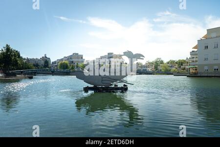 BERLIN, GERMANY - Jul 30, 2020: BERLIN, GERMANY July 30, 2020.  The whale fish sculpture in the Tegler Hafen. Stock Photo