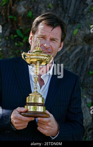 Sir Nick Faldo holding the world of golf's most competitive trophy - The Ryder Cup Stock Photo