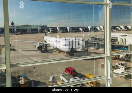 Lufthansa commercial jet liner at gate at Munich Airport, Germany Stock Photo