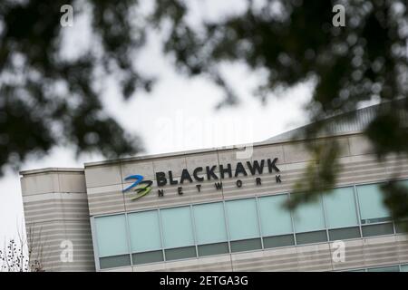 A logo sign outside of the headquarters of Blackhawk Network Holdings ...