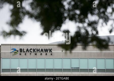 A logo sign outside of the headquarters of Blackhawk Network Holdings ...