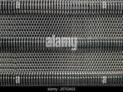 Background of the plate heat exchanger radiator grille Stock Photo
