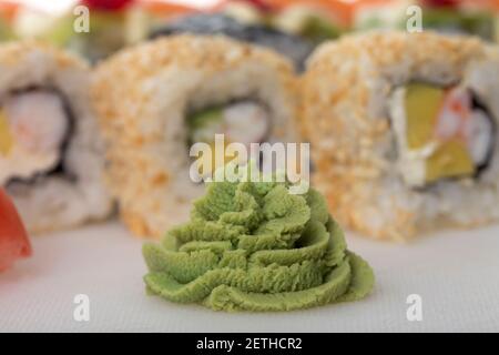 Bunch of hot wasabi for sushi rolls. Macro. Photo can be used asa whole background. Stock Photo