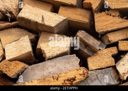 Background of chopped wood. Firewood for kindling the fireplace. Wood texture with mockup Stock Photo