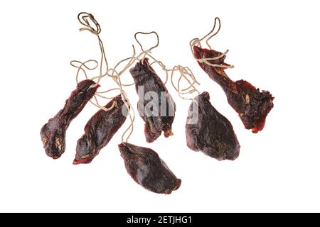 Overhead view of dried jerked deer or venison meat isolated on white background Stock Photo