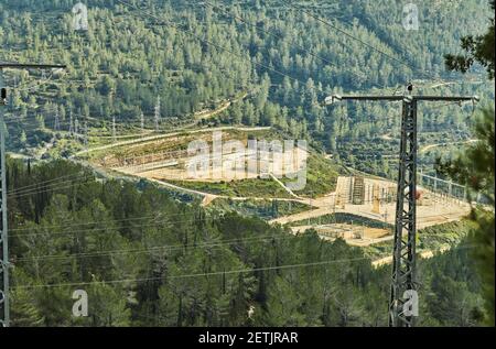 View from Sataf Park to the electrical substation surrounded by forest Stock Photo