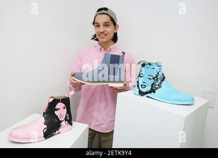for ikke at nævne Menstruation vandfald Miguel Lozano, with some of Gambino Alliance's products. The Chelsea boots  depicting Kim Kardashian and Marilyn Monroe are a collaboration with artist  Arturo Correa. (Photo by C.M. Guerrero/Miami Herald/TNS) *** Please Use