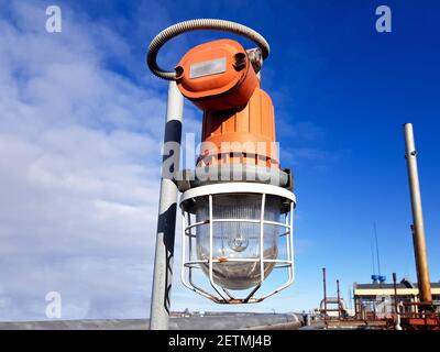 Explosion-proof lantern at a dangerous production facility close-up Stock Photo