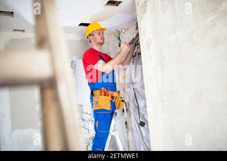 Gathering of current distribution cables in one point for further connecting Stock Photo