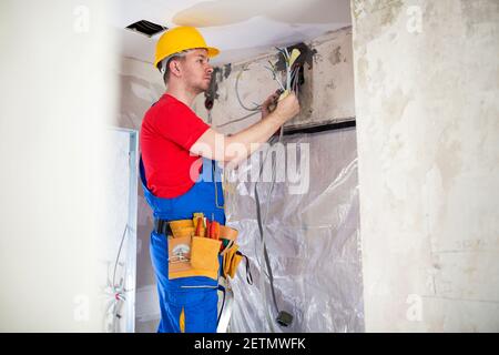 Gathering of current distribution cables in one point for further connecting Stock Photo