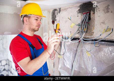 Checking of current distribution system using unimer electrical instrument Stock Photo