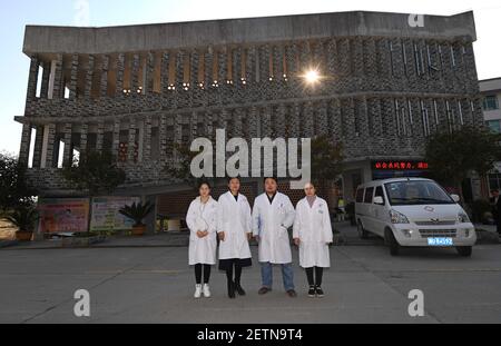 Changsha April 10 17 Xinhua Director Tian Rui 2nd L And Other Doctors Pose For A Photo Outside The Angdong Hospital At Angdong Village Of Baojing County Central China S