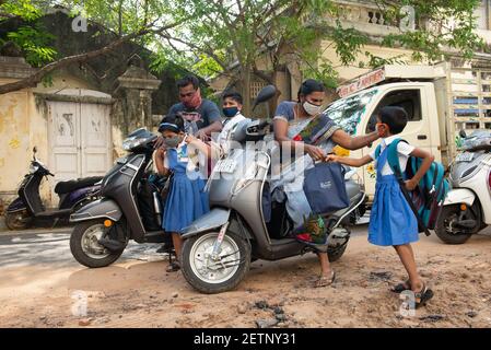 Pondicherry, India - 2 March 2021: Taking children to primary school during covid time Stock Photo