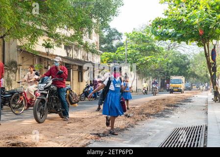 Pondicherry, India - 2 March 2021: Taking children to primary school during covid time Stock Photo