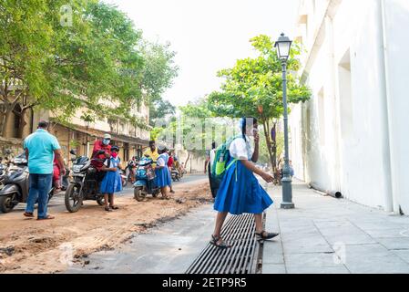 Pondicherry, India - 2 March 2021: Taking children to primary school during covid time Stock Photo