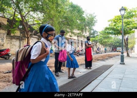 Pondicherry, India - 2 March 2021: Taking children to primary school during covid time Stock Photo