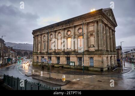 Todmorden viaduct with Burnley Rd  and Todmorden Town Hall in the wet Stock Photo