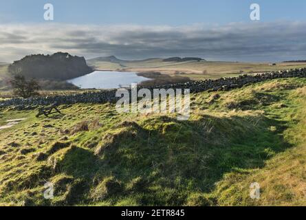 The outline remains of Milecastle 38 at Hotbank, overlooking Crag Lough - Hadrian's Wall, Northumberland, UK Stock Photo