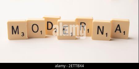 Coronavirus pandemic themed scrabble game word tiles on a white background Stock Photo