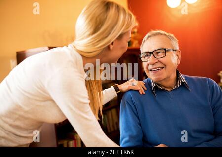 Perfect day for visit grandparents, smiling happy family together having great time Stock Photo