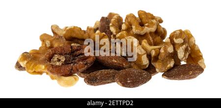 Portion of assorted nuts isolated on a white background side view. Stock Photo