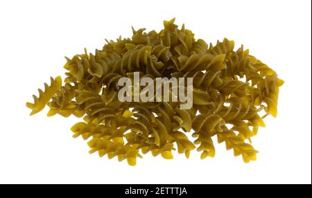 Serving of green pea fusilli pasta isolated on a white background. Stock Photo