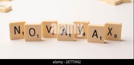 Coronavirus pandemic themed scrabble game word tiles on a white background Stock Photo