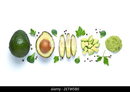 Flat lay composition with avocados in different formats, isolated on white background. Stock Photo