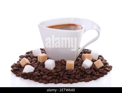 Cup of coffee with white and brown cubes sugar isoalted on white Stock Photo