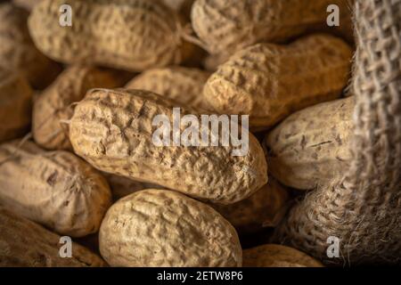 Close-up view of peanut in sack bag. Food background. Stock Photo