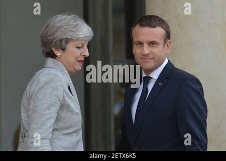  French President Emmanuel Macron welcomes British PM, Theresa May, as she arrives at The Élysée Palace . On Tuesday, June 13, 2017, in Paris, France. Photo by Artur Widak *** Please Use Credit from Credit Field *** 