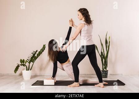 Yoga Pose: Revolved Lunge Pose | YogaClassPlan.com