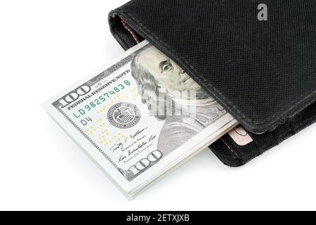 Black fabric wallet with dollars isolated on white background. Flat lay. Close up photo. Cash of hundred dollar bills Stock Photo