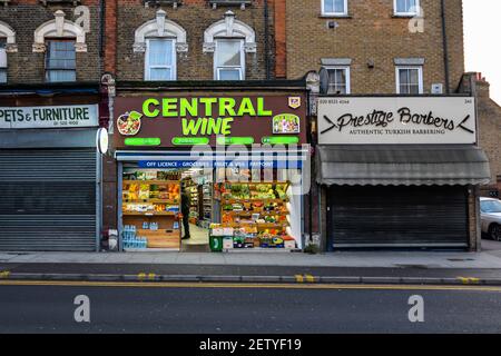 London/UK - 02/15/21 - A line of shops on Hoe Street in Walthamstow Stock Photo