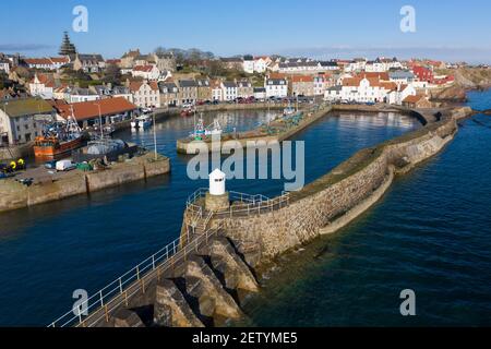 Aerial view from drone of harbour at Pittenweem fishing village in East Neuk of Fife, Scotland, UK Stock Photo