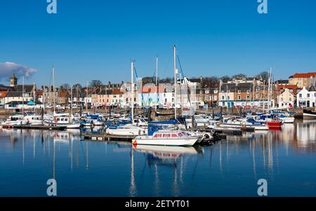 Waterfront and sailing boats in harbour at Anstruther fishing village in East Neuk of Fife, Scotland, UK Stock Photo