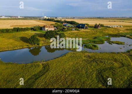 Off-grid farmhouse with bell tents in Elmley nature reserve, Sheppey. Stock Photo