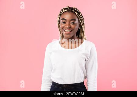 Portrait of smiling young friendly black woman Stock Photo