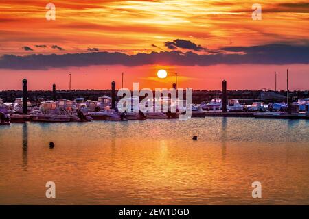 France, Vendée (85), île de Noirmoutier, L'Epine, Pointe du Devin, coucher de soleil sur le port de Morin Stock Photo