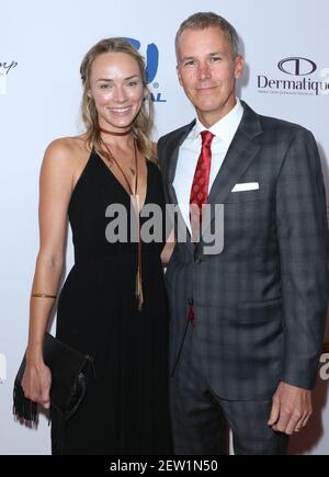 Andy Enfield (R) and wife Amanda Enfield at the 17th Annual Harold and
