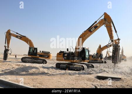 Jahra Governorate, Kuwait. 18th Oct, 2020. Construction machines work at the construction site of a project of China Gezhouba Group Corporation (CGGC) in a desert of Jahra Governorate, Kuwait, Oct. 18, 2020. China Gezhouba Group Corporation (CGGC), affiliated to China Energy Engineering Group Co., Ltd., handed over on Tuesday the second batch of its housing infrastructure project to the Kuwaiti side, marking the handover of the main works of the project. Credit: Liu Lianghaoyue/Xinhua/Alamy Live News Stock Photo